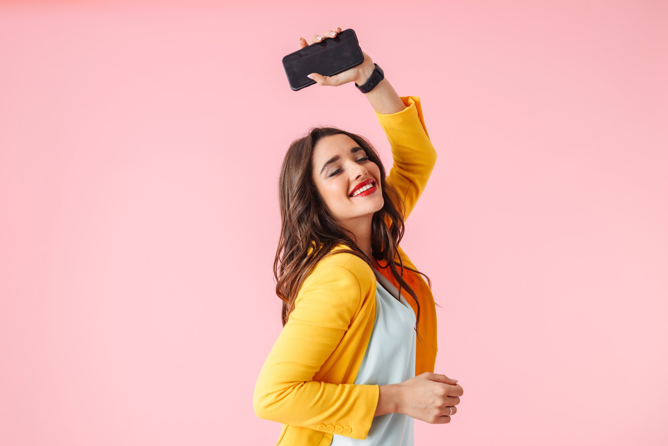 Woman Dancing with Her Phone 